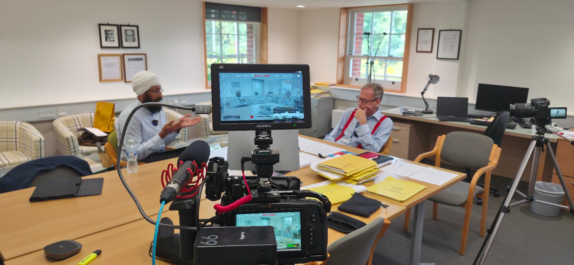 Mandeep Singh recording the podcast with Barnaby Lenon CBE